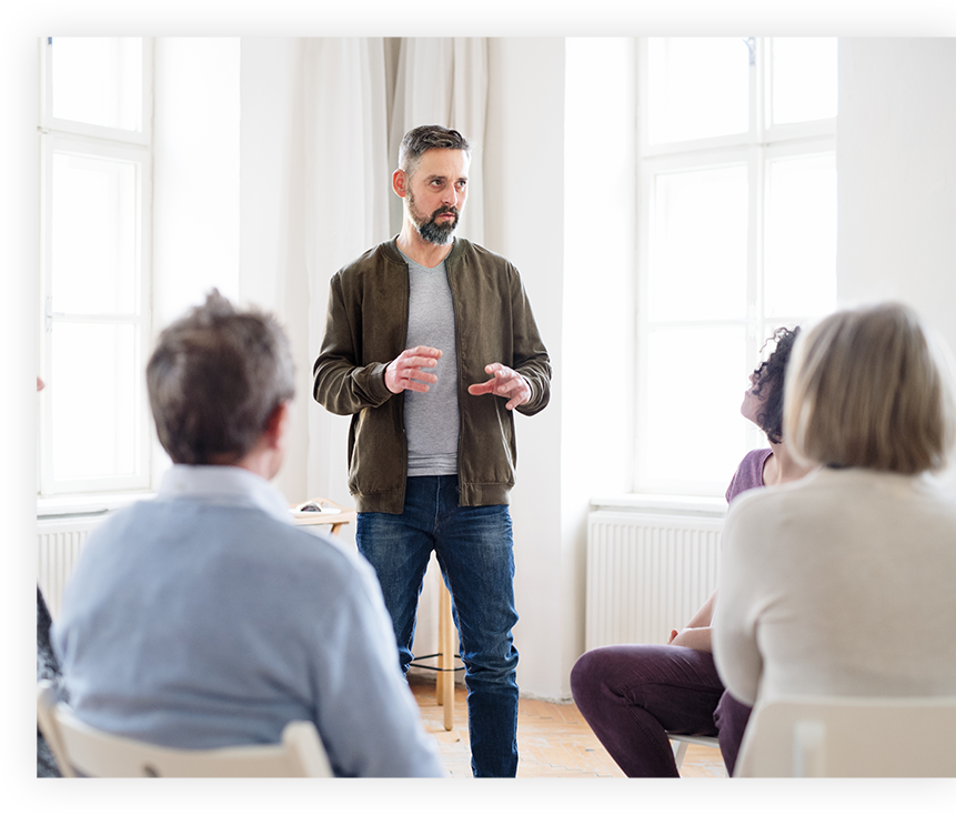 Man speaking to group