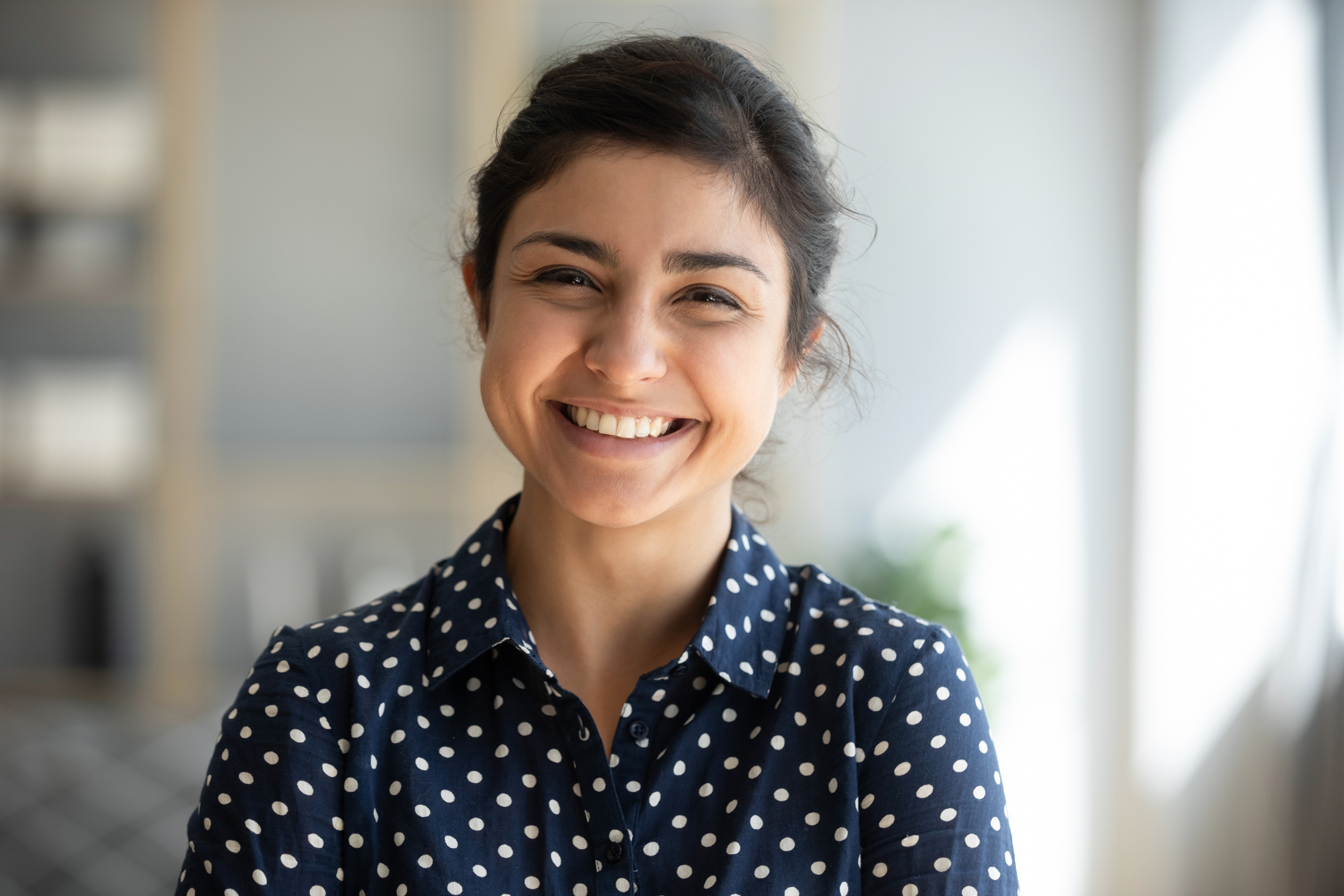young indian woman looking happy