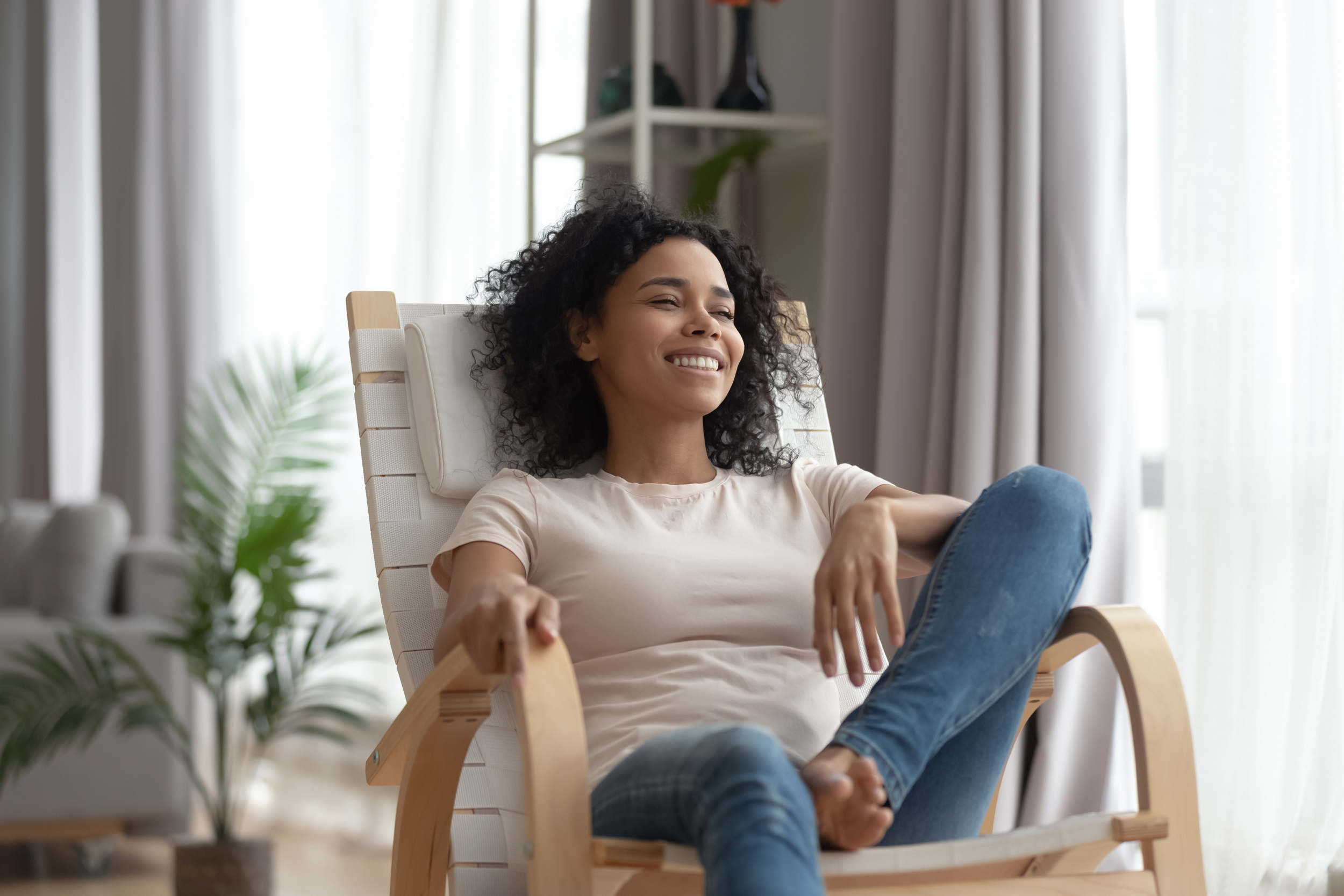 young woman relaxing in chair