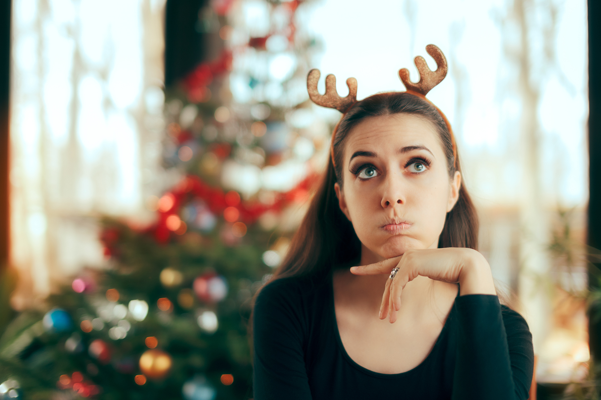 young woman stressed at Christmas
