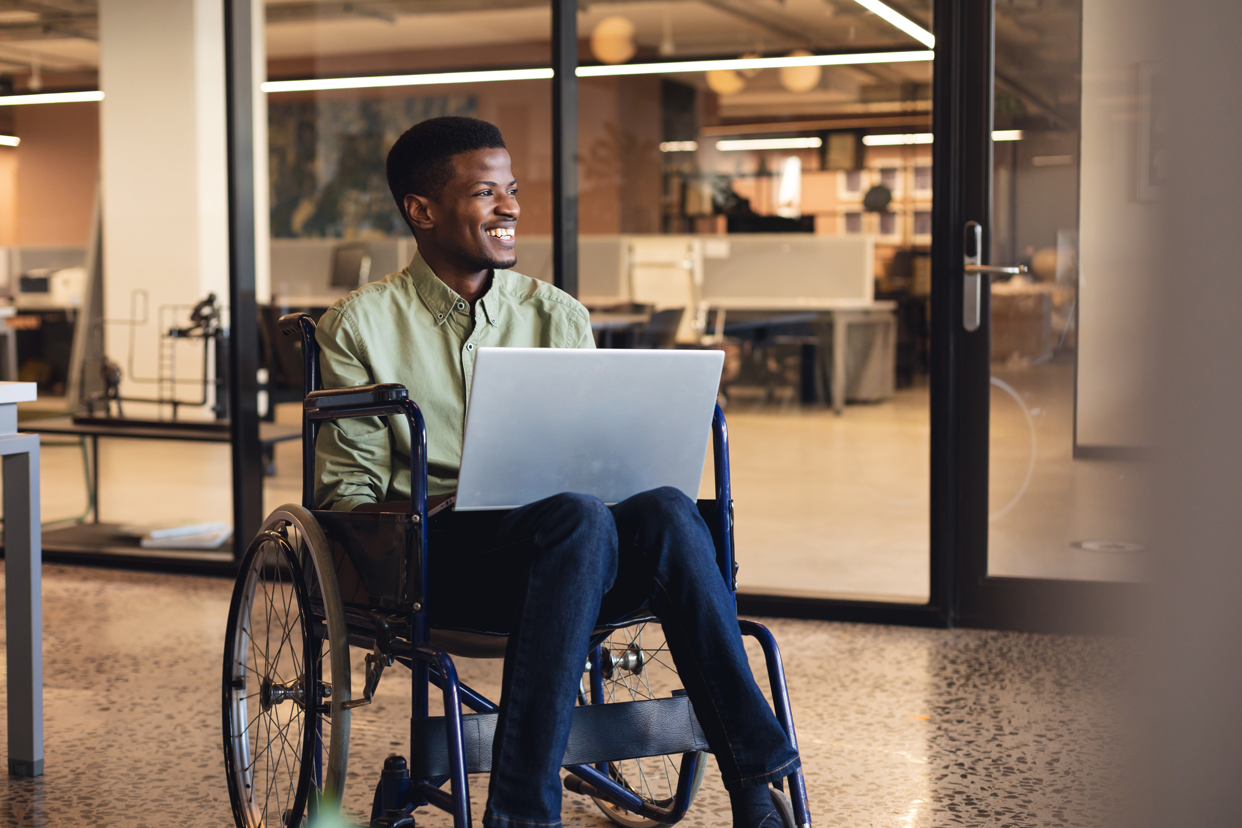 young black man in wheelchair
